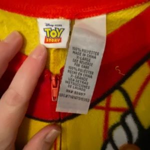 Toy Story “woody” one piece pajama/dress up set.